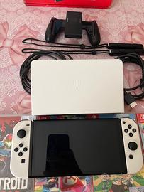 Nintendo switch oled più giochi metroid e arms