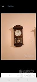 orologio a pendolo in legno 