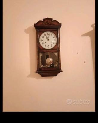 orologio a pendolo in legno 