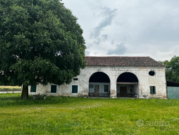 Rustico con terreno edificabile