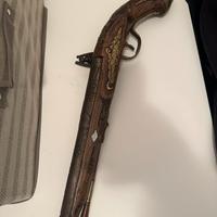 Pistola antica decorativa a pietra focaia