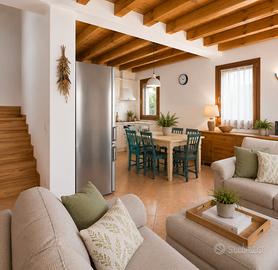 Casa indipendente di testa con giardino