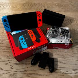 Nintendo Switch Oled con giochi ed accessori