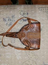 coccodrillo vero fatto a borsetta,