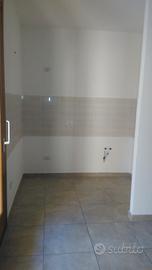 Trilocale con spazio esterno coperto