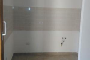 Trilocale con spazio esterno coperto