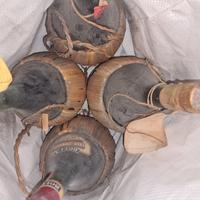 10 antiche bottiglie di vino