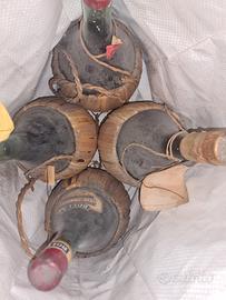 10 antiche bottiglie di vino