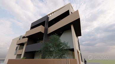 Quadrivano al piano terra con giardino e p.auto