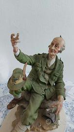 Statua Capodimonte Vecchia Gloria alpino seduto