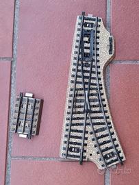 Marklin binari con massicciata scambi e trasfo.