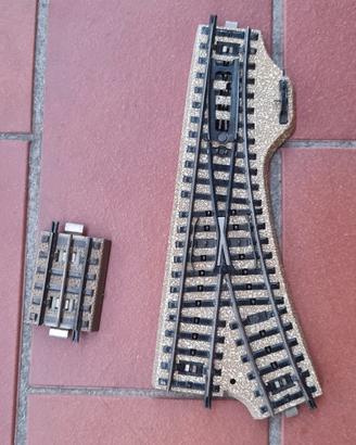 Marklin binari con massicciata scambi e trasfo.