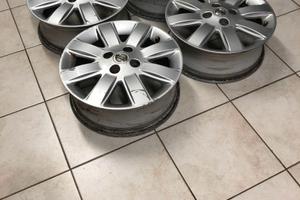 CERCHI NISAN MICRA K12 15 POLLICI PEUGEOT,CITROEE