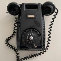 Telefono a muro vintage a disco