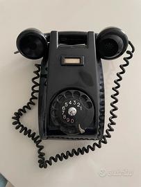 Telefono a muro vintage a disco