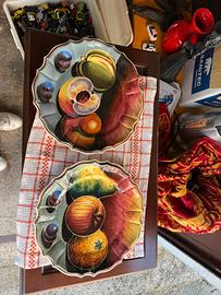 Coppia piatti decorativi in ceramica