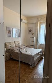 Armadio 4 ante a specchio