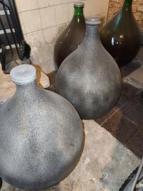 4 damigiane verdi in vetro, altezza circa 50 cm