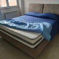letto matrimoniale in similpelle con contenitore