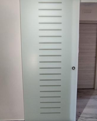 Porta scorrevole in vetro