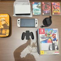 Nintendo Switch OLED + 3 Giochi + Accessori