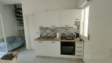 Bilocale con ampio terrazzo e doppi servizi