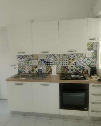 Bilocale con ampio terrazzo e doppi servizi