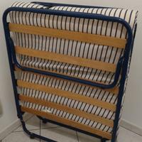 Brandina pieghevole con materassino e rete a doghe