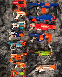 Lotto 12 Blaster Nerf e X-Shot usati con accessori