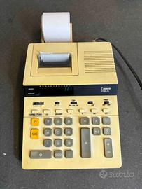 Calcolatrice con rotolo vintage