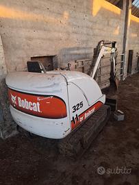 Escavatore per giardino