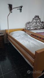 Letto ortopedico motorizzato, girello ascellare