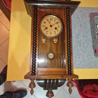 orologio a pendolo a muro