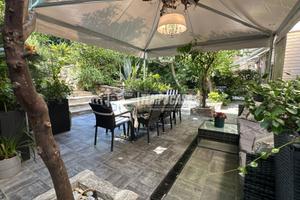 Elegante Residenza con Giardino Privato