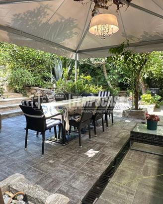 Elegante Residenza con Giardino Privato