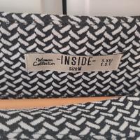 Minigonna bianca e nera e scamiciata a quadretti