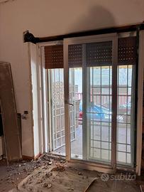 Porta scorrevole con anta ribalta