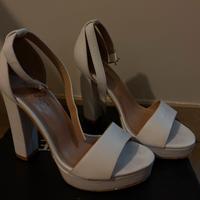 Tacchi bianchi con plateau