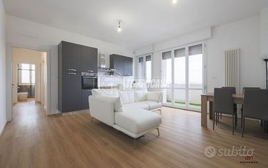 Trilocale al settimo piano con vista San Luca