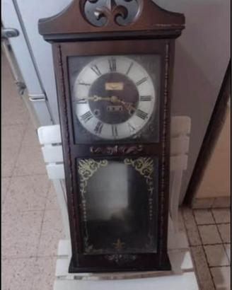 Orologio a pendolo a corda