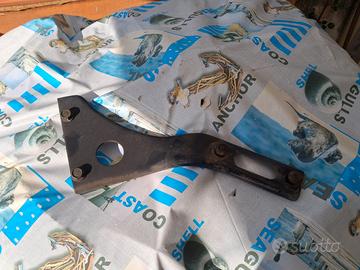 supporto scarico shadow 125