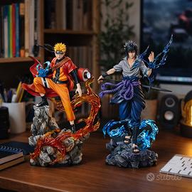 Action figure Naruto e Sasuke con collezione anime