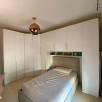 Camera con letto contenitore