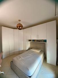 Camera con letto contenitore