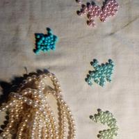 Perle in vetro e plastica