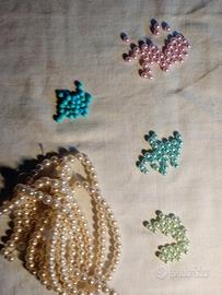 Perle in vetro e plastica