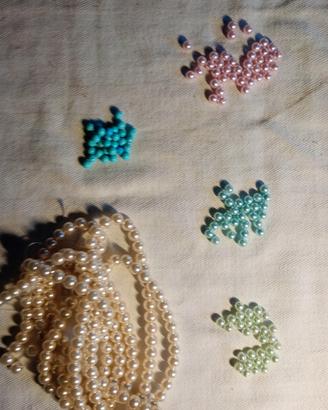 Perle in vetro e plastica