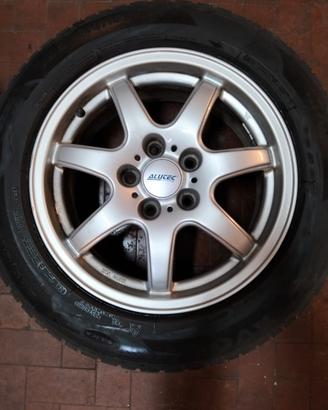 CERCHI IN LEGA R16 5 FORI  - COMPLETE DI GOMME