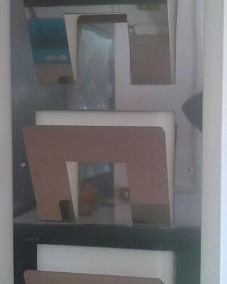 porta riviste a muro inox