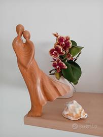 Scultura di coppia in legno di Tasso